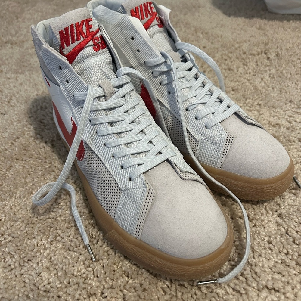 Nike High-Top Sneakers with Red Swoosh